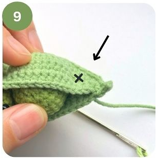 Make a few stitches at the "x" marked point, sewing through both layers
