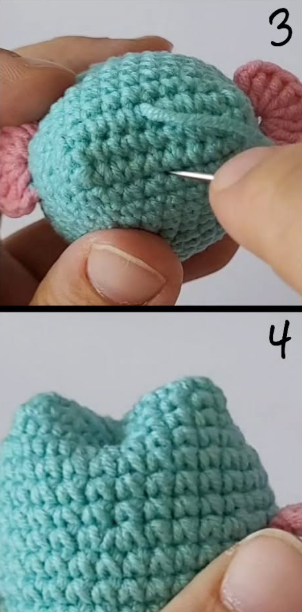 Pull tightly to shape the ears.