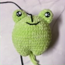 Pull the yarn out from the center of the mouth on R15