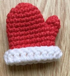 Fold the cuff of the mitten down.